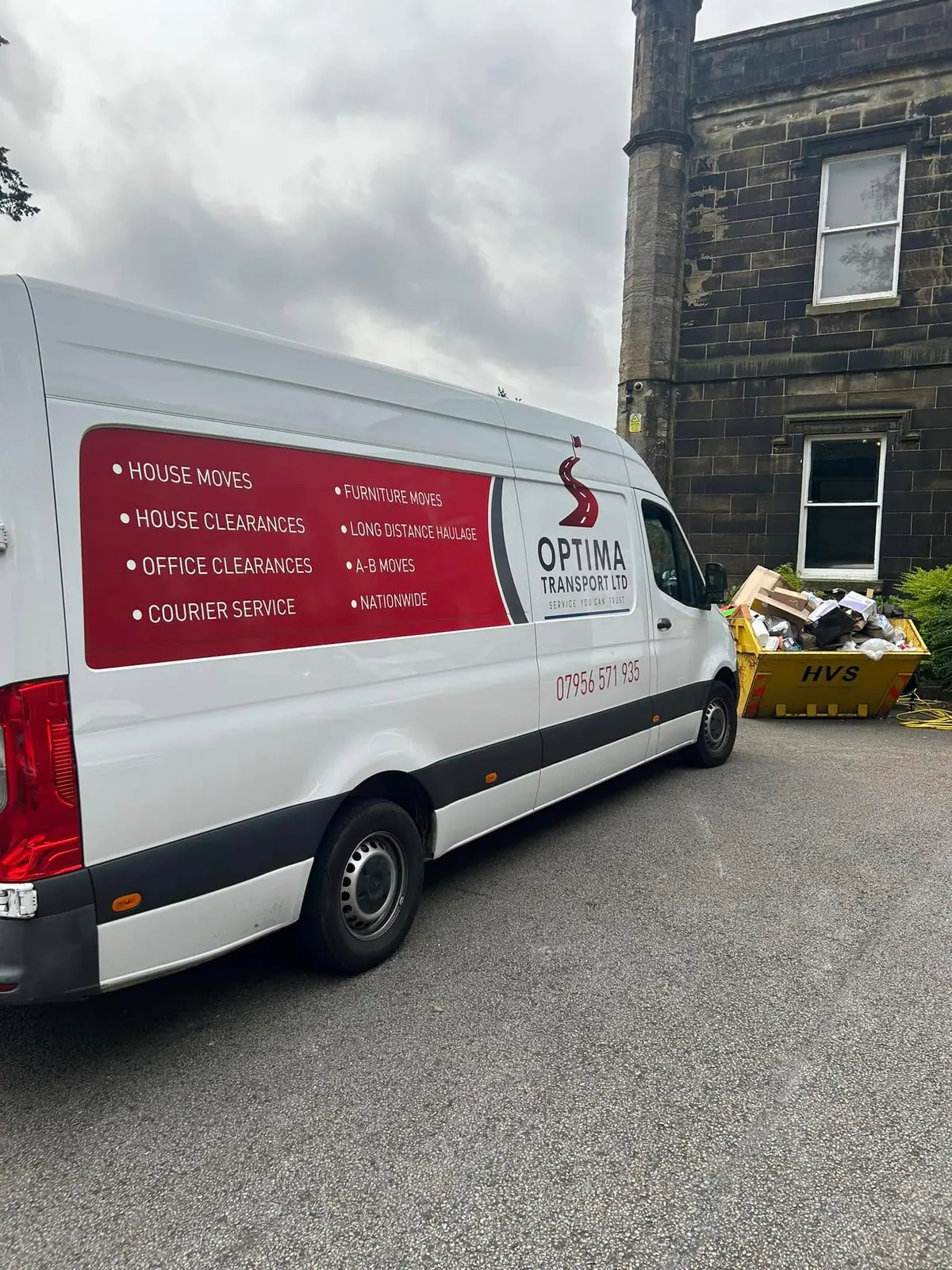 Optima Transport clearance van parked beside a skip outside a stone property in Yorkshire