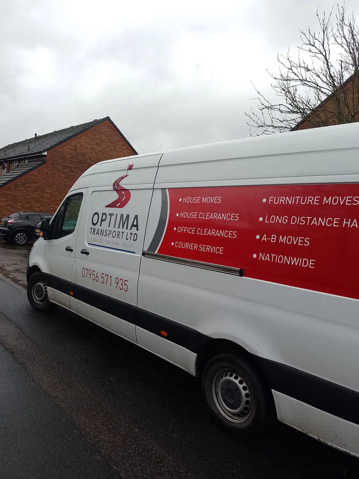 Optima Transport van with long distance haulage lettering on the road in Yorkshire