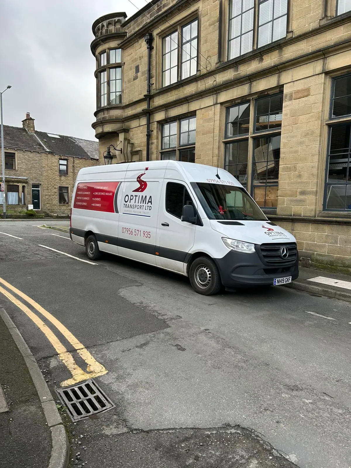 Optima Transport van outside a period stone property ahead of a probate clearance